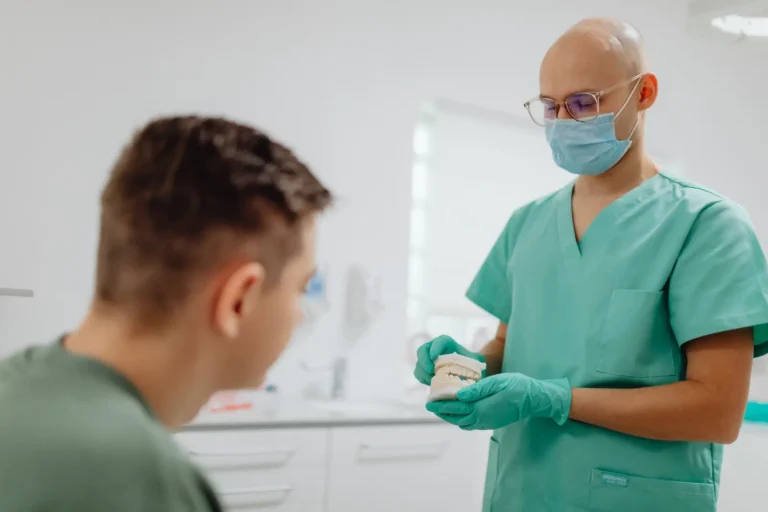 Dentist explaining a procedure to a patient